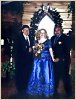 The Newlyweds with their Officiant.