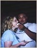 The Groom feeds the Bride.